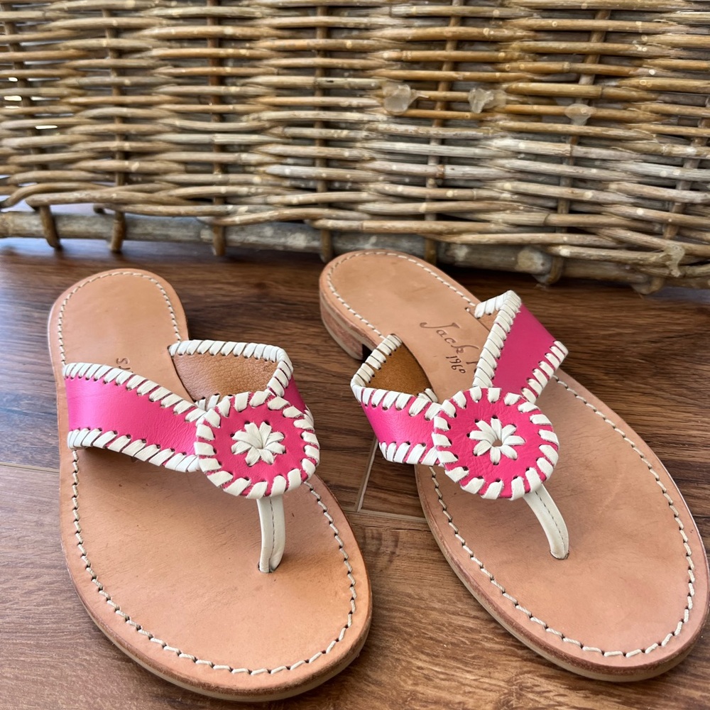 Jack Rogers pink with white stitch edge sandals.